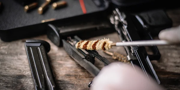 Knightrunner Professional Firearm Cleaning Professional firearm cleaning with rod and bore brush