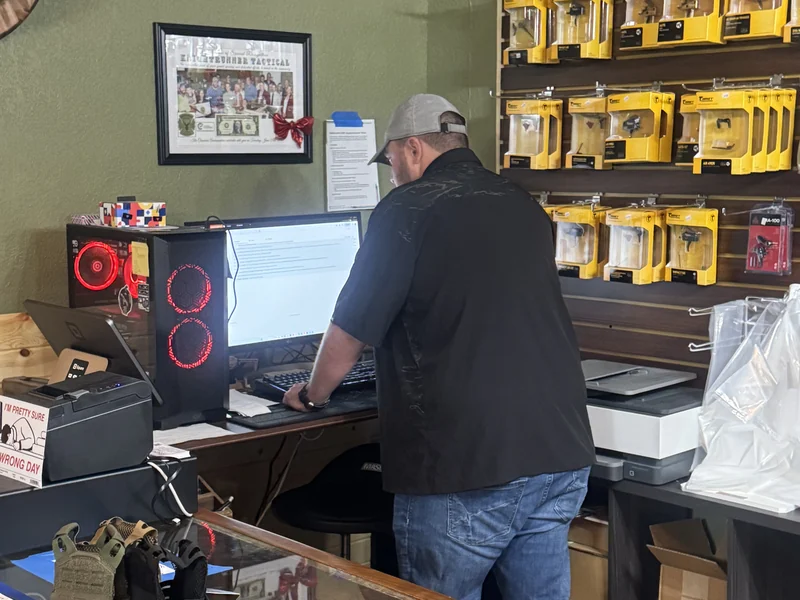 Knightrunner Serving Washington Iowa Owner at the front counter inside Knightrunner Tactical